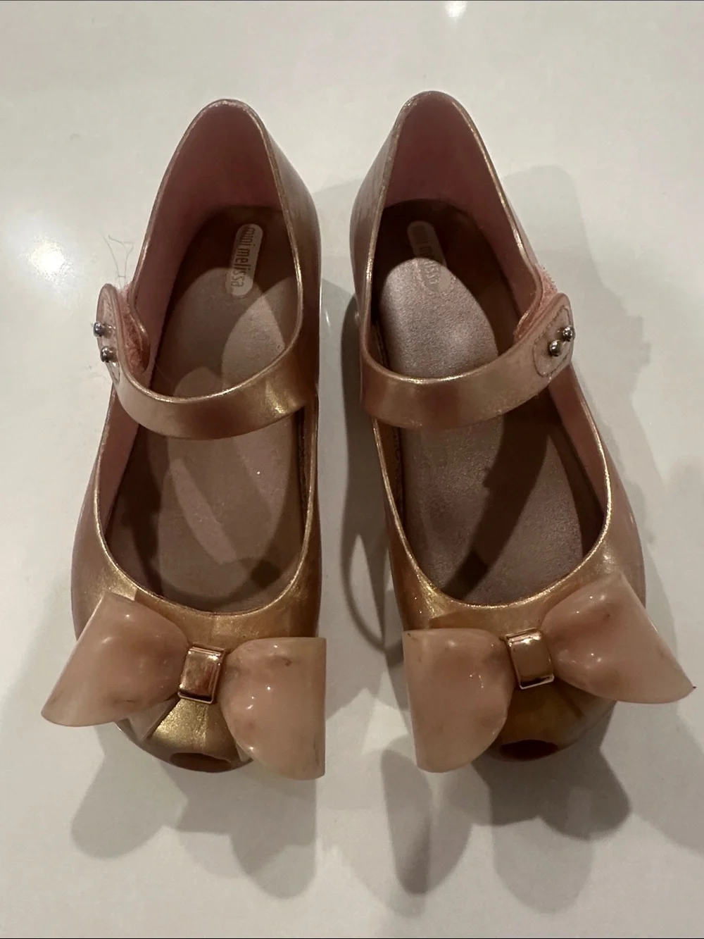 Mini Melissa Metallic Rose Gold Bow Mary Jane Shoes